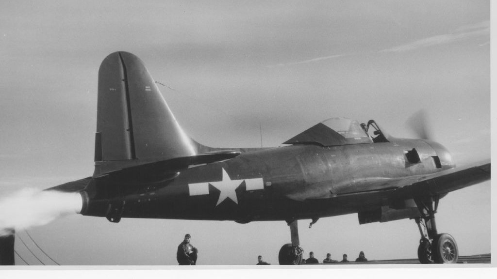 NavalInstitute's tweet image. #OTD in 1945, a mixed-power Ryan FR-1 Fireball was forced to use its jet engine to land on USS Wake Island after its piston engine failed. In doing so, it became the jet to land on a carrier, ushering in a new era of naval aviation. #FlyNavy