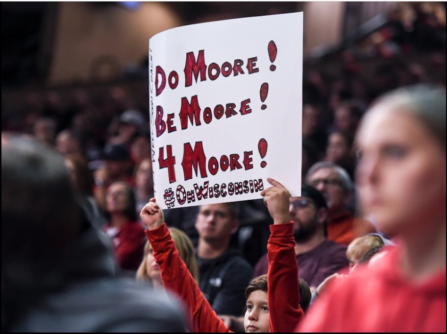 Cat_Clark34's tweet photo. @BadgerMBB Here's my son with his #DoMooreBeMoore4Moore sign at last night's game.
#GetWellSoonCoach #OnWisconsin https://t.co/StcFwjPXZh