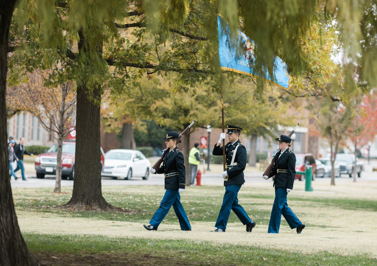 UofOklahoma's tweet photo. The @OUSVA and members of the OU Community gathered today for a flag raising ceremony and remarks from guest speaker, former Seal Team 2-member and retired Chaplain, Lieutenant Colonel Michael Thompson. #OUFamily https://t.co/awJDcGWlPq
