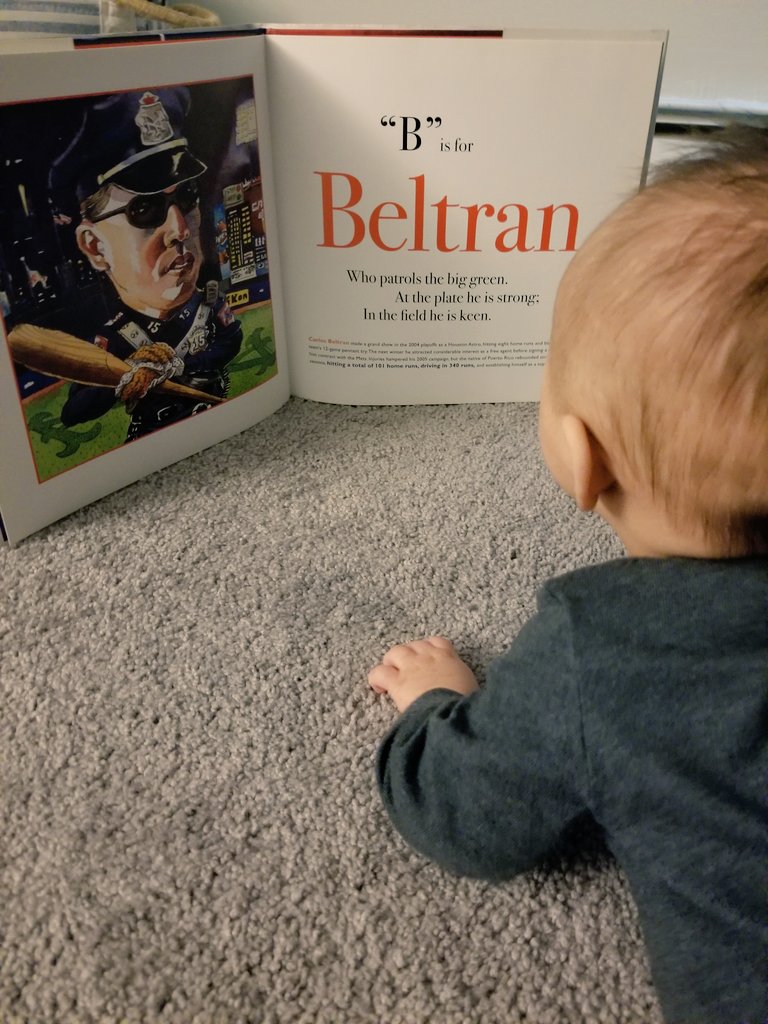 Tummy time with <a href="/carlosbeltran15/">Carlos Beltran</a>. Gotta start 'em young!