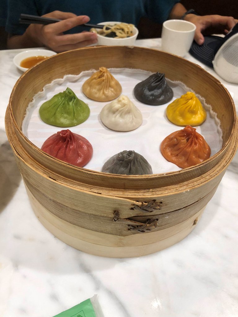 INeedThatFood's tweet photo. Multi-colored Soup Dumplings in Shanghai https://t.co/jaT1r7XXV6