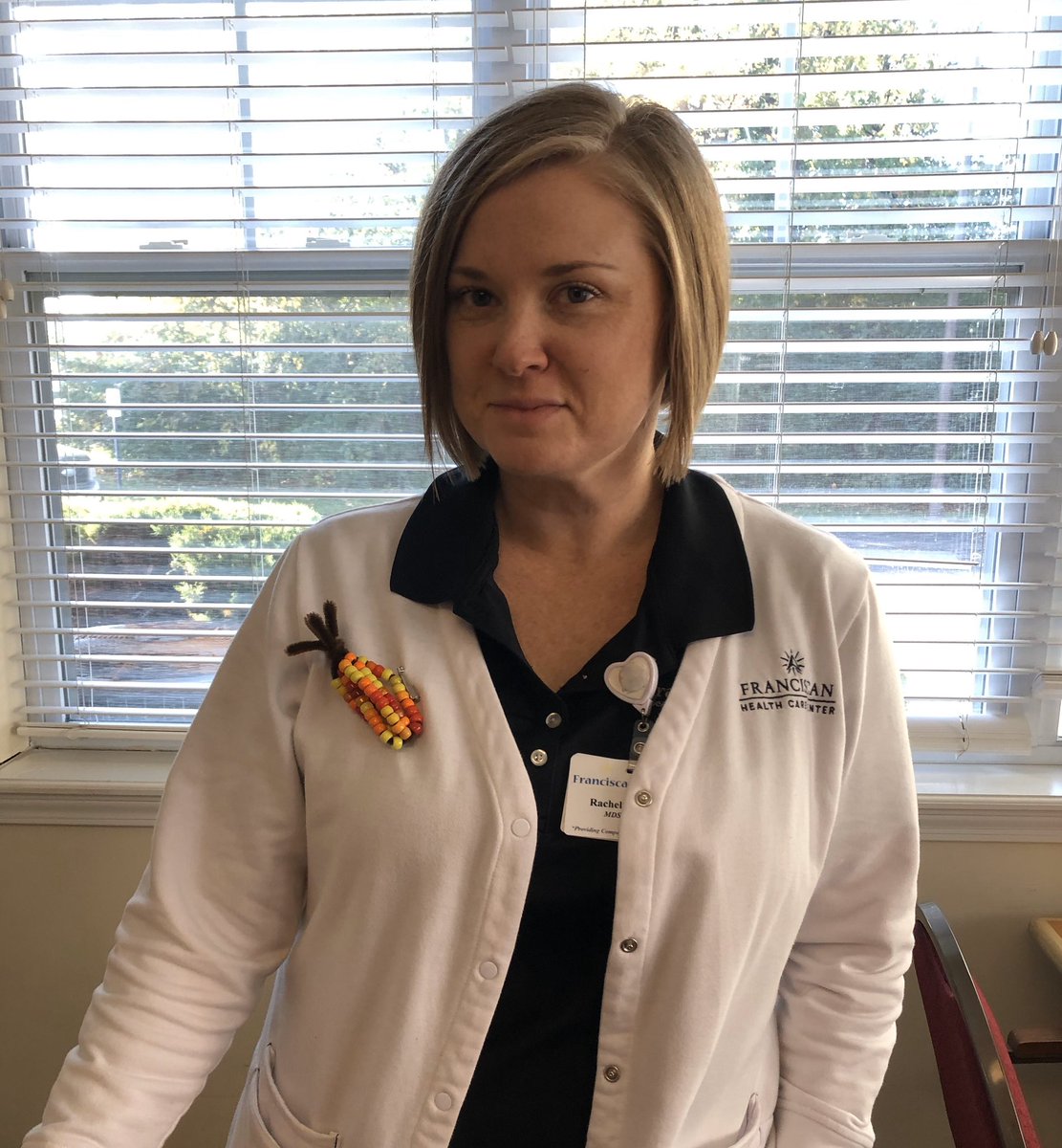 FranciscanHCC's tweet photo. Proudly wearing our Indian Corn pins, made by our residents! 🧡 #WeLoveOurResidents #FranFamily #TrilogyLiving https://t.co/dsz5EnB4XH