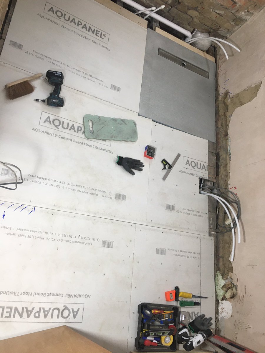 Floor and @MarmoxUK linear shower tray dropped in by removing 15mm off the floor joists. @aquapanel 6mm tile backer board fixed with 200 stainless steel screws. #bespoke #wetroom #GetBasicsRight #preparation