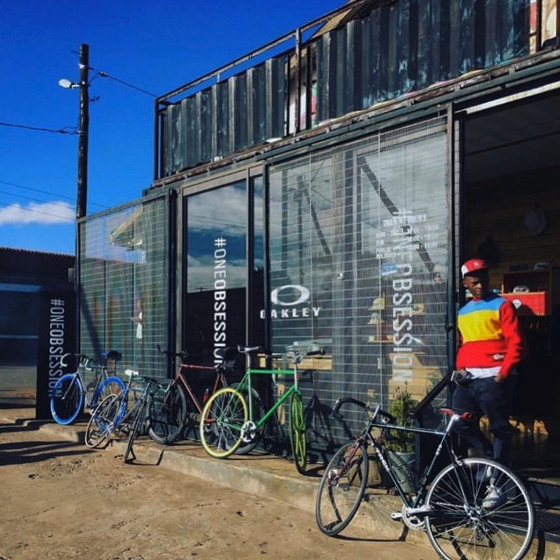 ThesisLifestyle's tweet photo. A young #ThrowbackThesis to the much simpler days where we used to ride our bikes at our #Kagiso store with the @oakley team. #thesislifestyle #defineyourself #fixie 📸 @thera_vanthof https://t.co/iybt3CVfmX