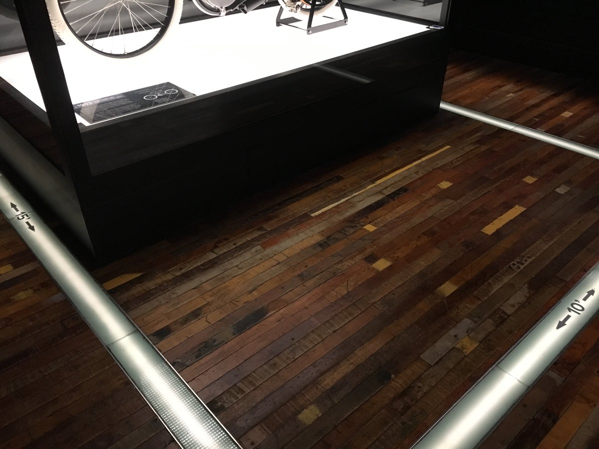 MidWestMuseums's tweet photo. #museum30 day 7: Last. To Last. Longevity. Museums keep stories alive, but how they share them evolves over time. Pictured: @hdmuseum shows the size of the 1st Harley shop w/ a light strip in the floor. We *imagine* being inside as we study the bike on display. #nowallsneeded https://t.co/ktQEeXVc4u