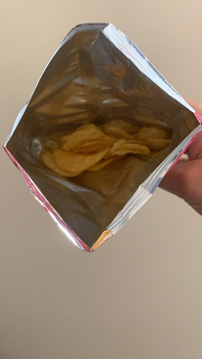Robson847's tweet photo. Dear @walkers_crisps when did you think this was an appropriate amount of crisps in a packet? #nothinginthere #joking #why https://t.co/OSw8Y22K8Q
