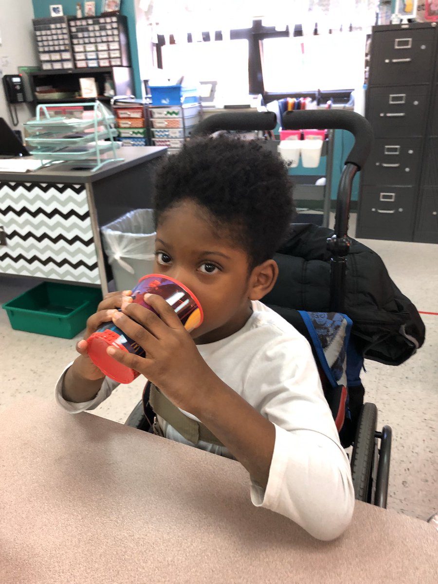 Cooperteachwsd's tweet image. Practicing drinking out of an open cup. Right now we are just drinking air :) the girls were great examples :) The best is how proud Zion is at himself #wearwduello