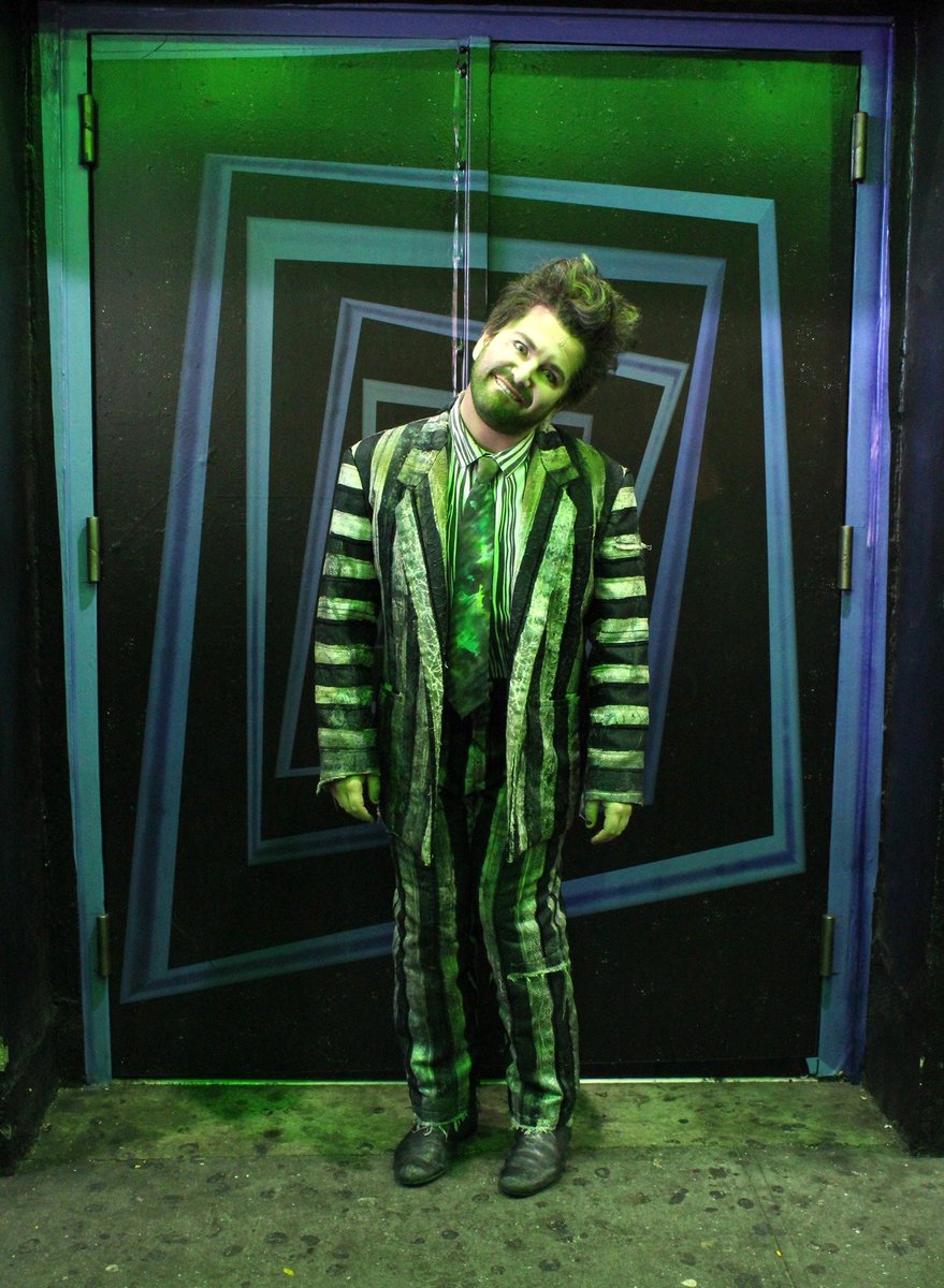 BeetlejuiceBway's tweet photo. Today we're throwing it back to Halloween &amp; our final in-person costume contest! Over 70 breathers entered, but a sandworm slithered to the top of the pack (#4 was a close second, though 👻). Congrats to Nelly, whose hand-painted costume took our breath away–literally! 🖤💚🖤 https://t.co/UxXsgwykcS