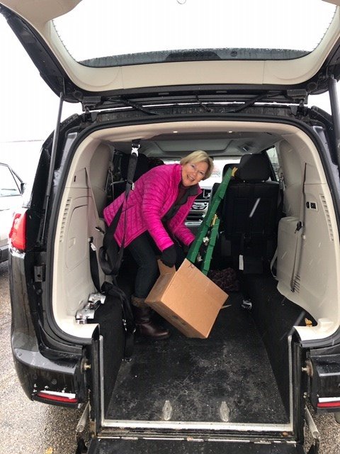 Zonta Elf, Rhonda Estes, setting up for Festival of Trees this weekend at Golden-Fowler Home Furnishing.