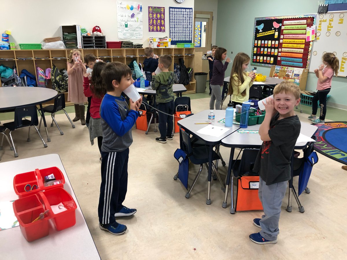 Using a cup phone to test how sound waves travel best. #firsties #scienceisfun