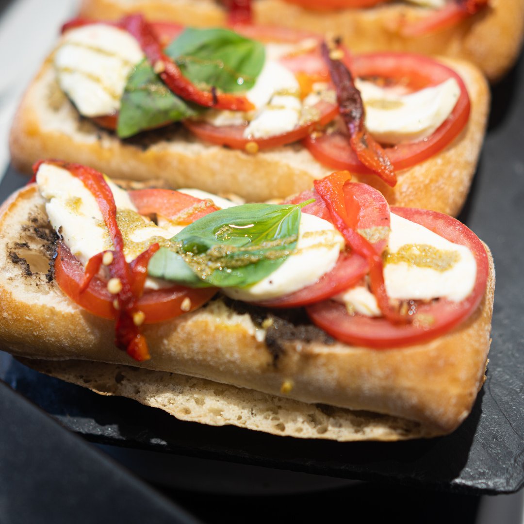 The decadence is in the details. How delicious do our Tuscan sandwiches look? 

Sun-dried tomatoes, mozzarella, black olives, and basil pesto.