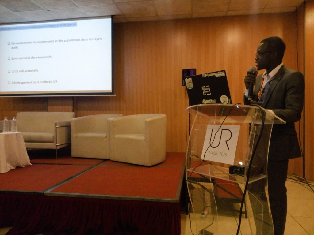 #SotMAfrica2019 chair presenting on how they used Geospatial data and analytics to support the work of the  Ministry of health to eliminate African Human Trypanosomiasis