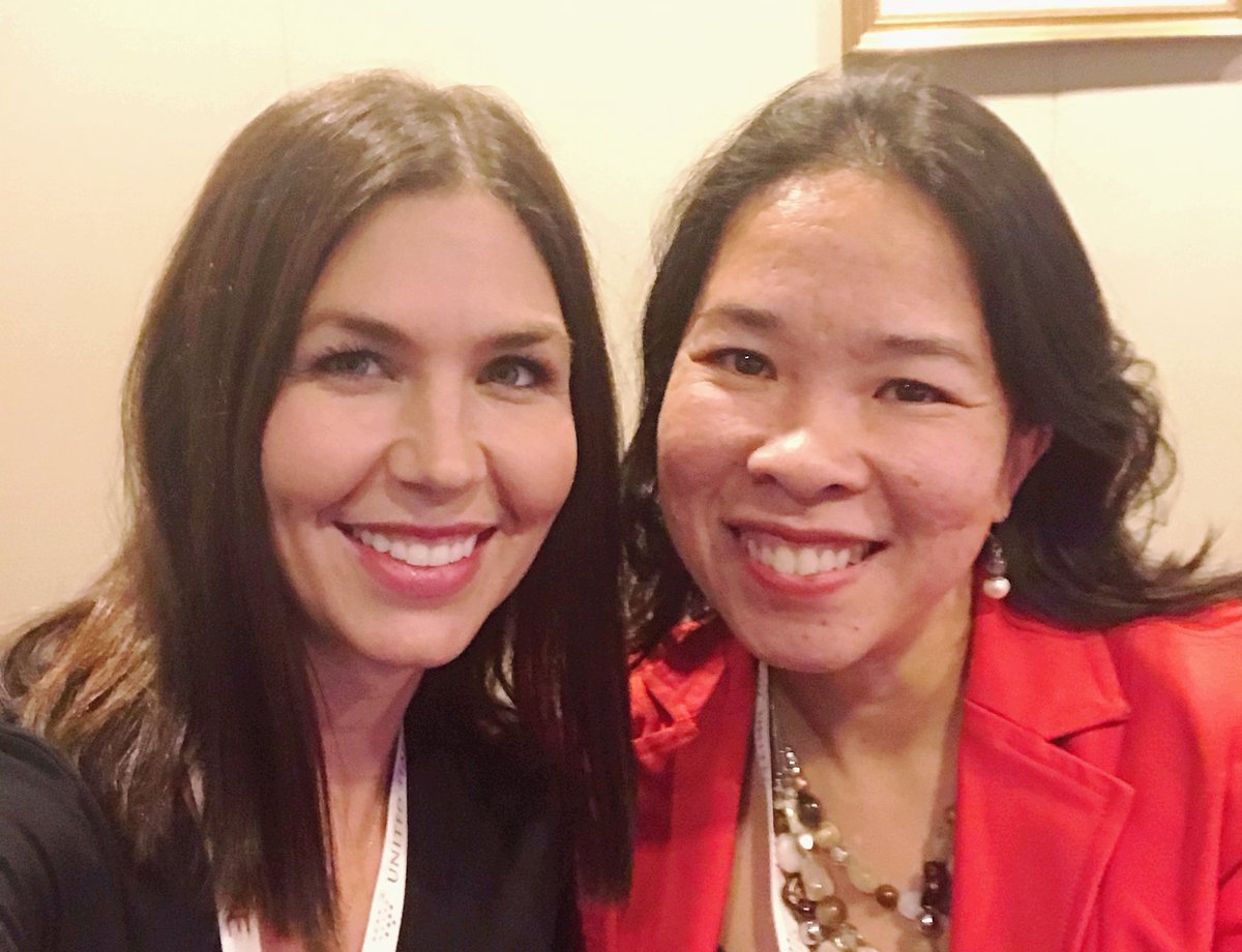 Photo of Natalie and I smiling at the camera