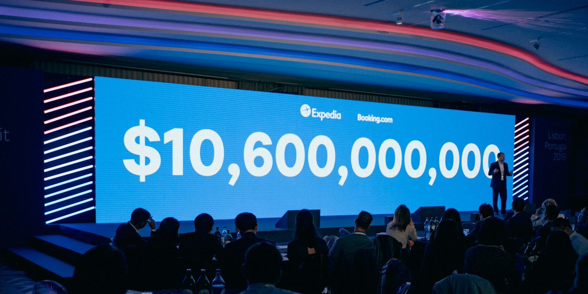 colinalewis's tweet image. What is this number? Its the amount Booking.com and Expedia spent in 2018 on Google Advertising. And, that was an 8% increase on PY. Yes $10.6 with 8 zeros.  Talking at the @OpenJawTech Global Travel Summit (I'm the dark shadow on the right!)