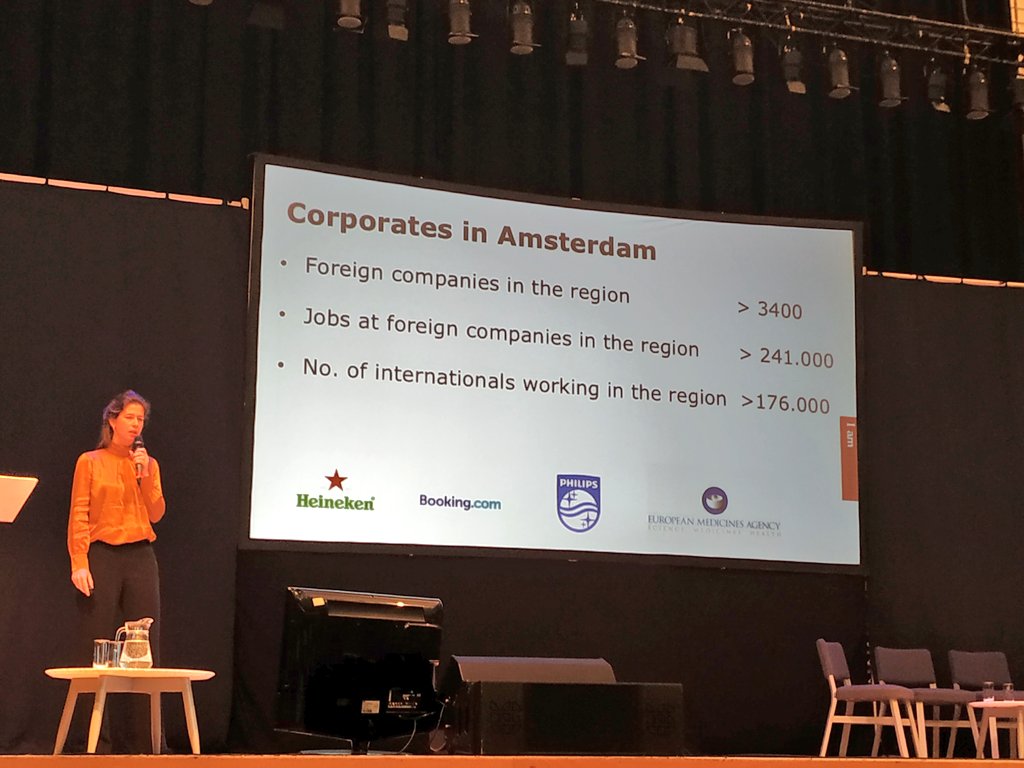 ThePlaceTeamDOT's tweet photo. Mari van den Boogaard talking about Amsterdam and nearby places working together to benefit each other. Sharing resources, people and businesses to maximise their potential @Scot_IDs @ScotlandsTowns #stc19 https://t.co/o1si6JOzLy