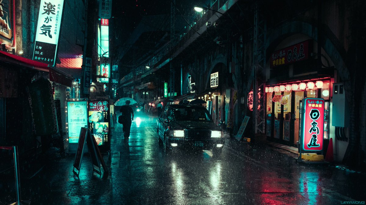 Photography by Liam Wong of Tokyo at night captured during a typhoon. The silhouette of a man carrying an umbrella walking away from the camera as a taxi drives towards. It is teal and blue in color with red highlights. It is along a large overhead train station with restaurants under the arch.