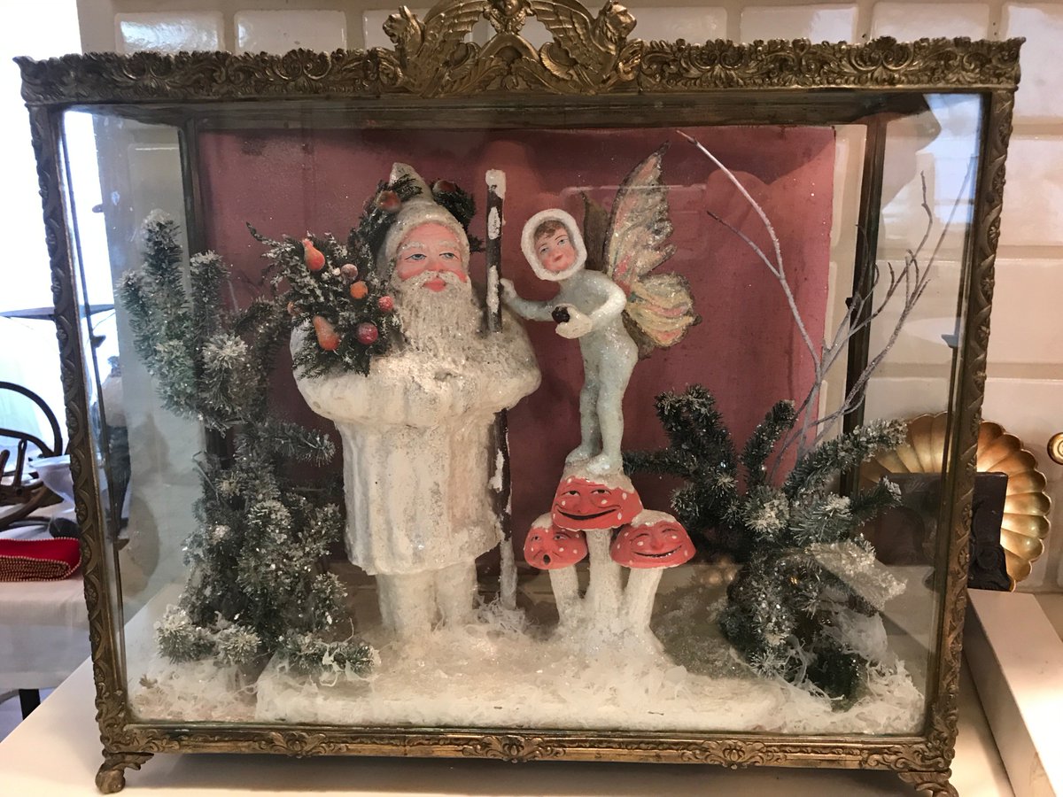 Santa, fairies and smiling mushrooms in a glass diorama for your holiday collecting and decorating.  So cute and only one of nearly a dozen such dioramas at our sale, this weekend, Fri-Sun. ow.ly/aQJN50xg9ZX for details! #VintageChristmas  #Santa #Santadiorama