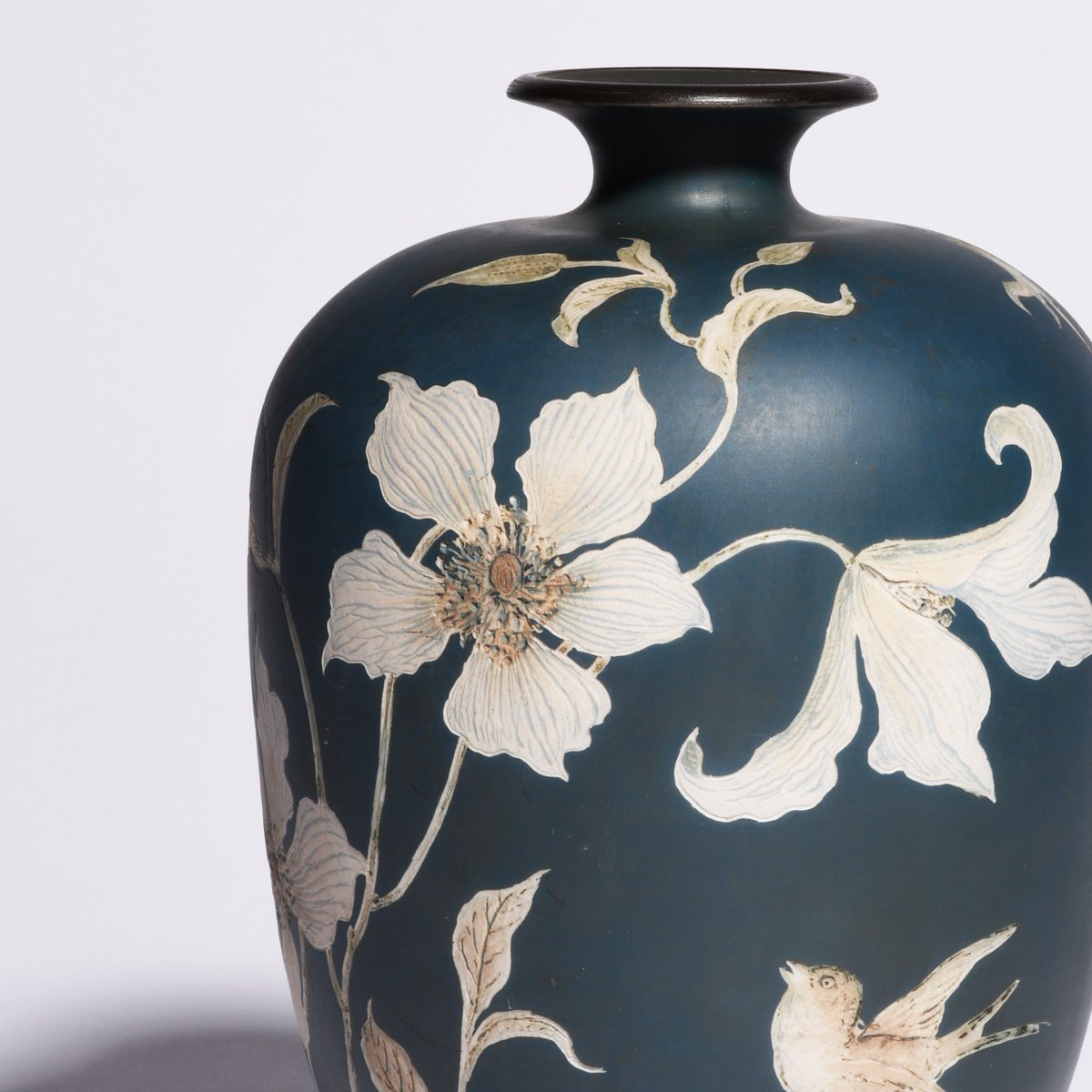 This rare #MartinBrothers stoneware cameo vase by Edwin and Walter Martin decorated with two #birds flying amongst clematis flowers is lot 2 in the highly anticipated #BritishArtPottery auction on 27th November. It is estimated at £800-1,200. 
buff.ly/2NF8NHX