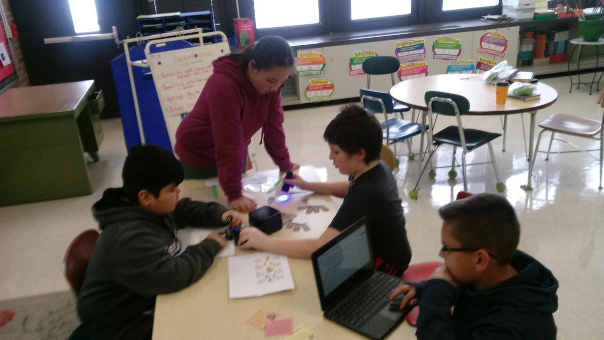 Fifth grade LEAP students working well together problem-solving during a game of Breakout EDU. <a href="/D45Schafer/">Schafer School</a>