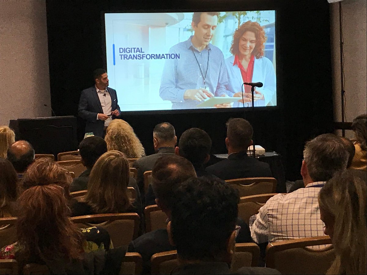 IQVIA_global's tweet photo. Standing room only today at Tal Rosenberg's @Dreamforce presentation, "The Era of Orchestration." He was joined on stage by IQVIA's  Nadaraja Srivatsan. If you missed this amazing #DF19 presentation, head to booth 1039 to speak with our #IQVIATech team and learn more now! https://t.co/63uKNrJwOz