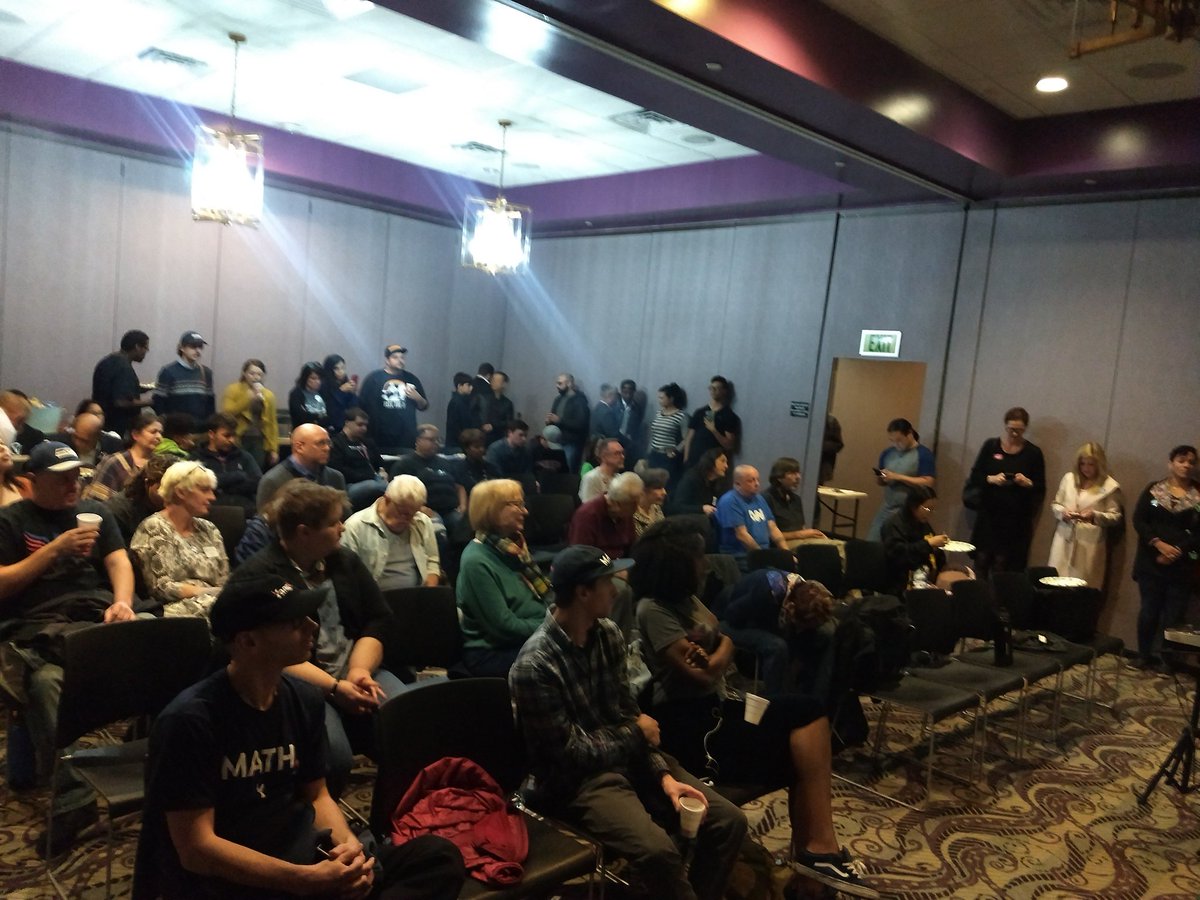 OCyanggang's tweet image. Repping @AndrewYang among Dems at #DemDebate5.  Even the Yangbot made it!