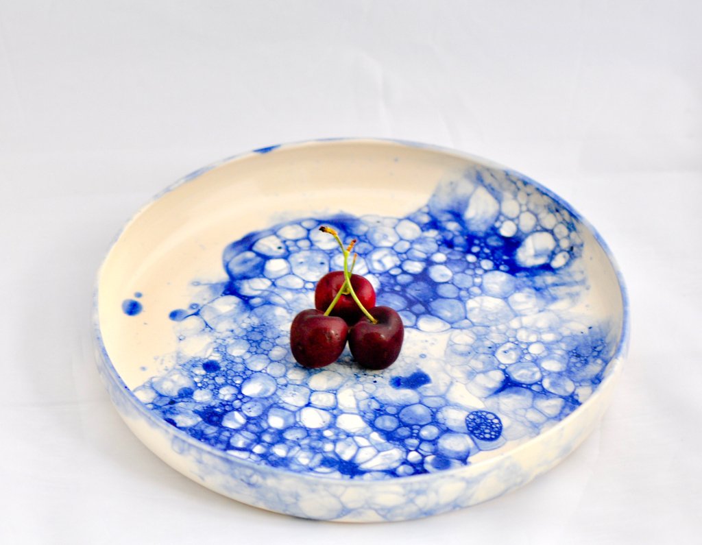 This beautiful porcelain stoneware with royal blue or black bubble glaze made by Design by Vu completely takes our breath away! Given its hand-finished nature, variations in the bubble design are to be expected and celebrated. 

Shop now: makesavannah.com/shop-savannah-…
