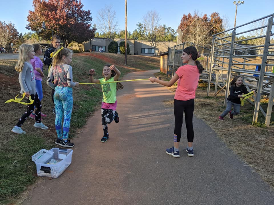 gotrwnc's tweet image. Love the expressions on these girls&apos; faces as their team cheered them across the finish line! Practice 5k is in the books for @BuncombeSchools North Buncombe Elementary School. These girls are ready for the #GirlsontheRun of WNC 5K on Dec. 8! Register at gotrwnc.org/5k.