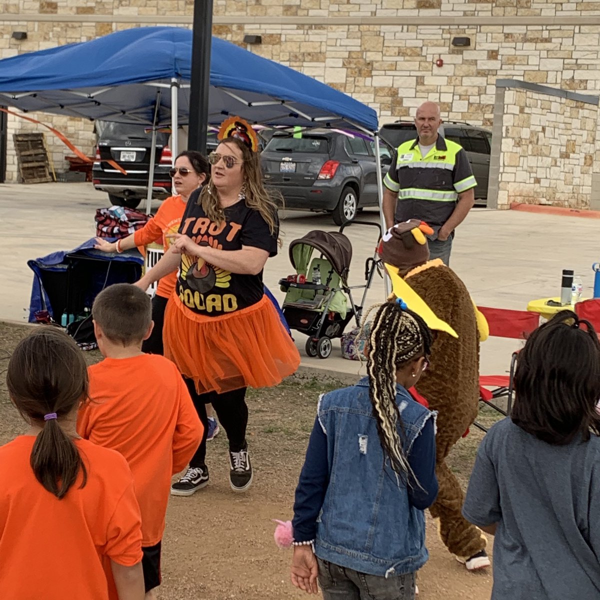 PTA leading a fun run and awesome dance moves!!! Thanksgiving luncheon and Turkey Trot - thank you to PTA for raising funds for the Pumas! #WeAreGISD #PumaPride