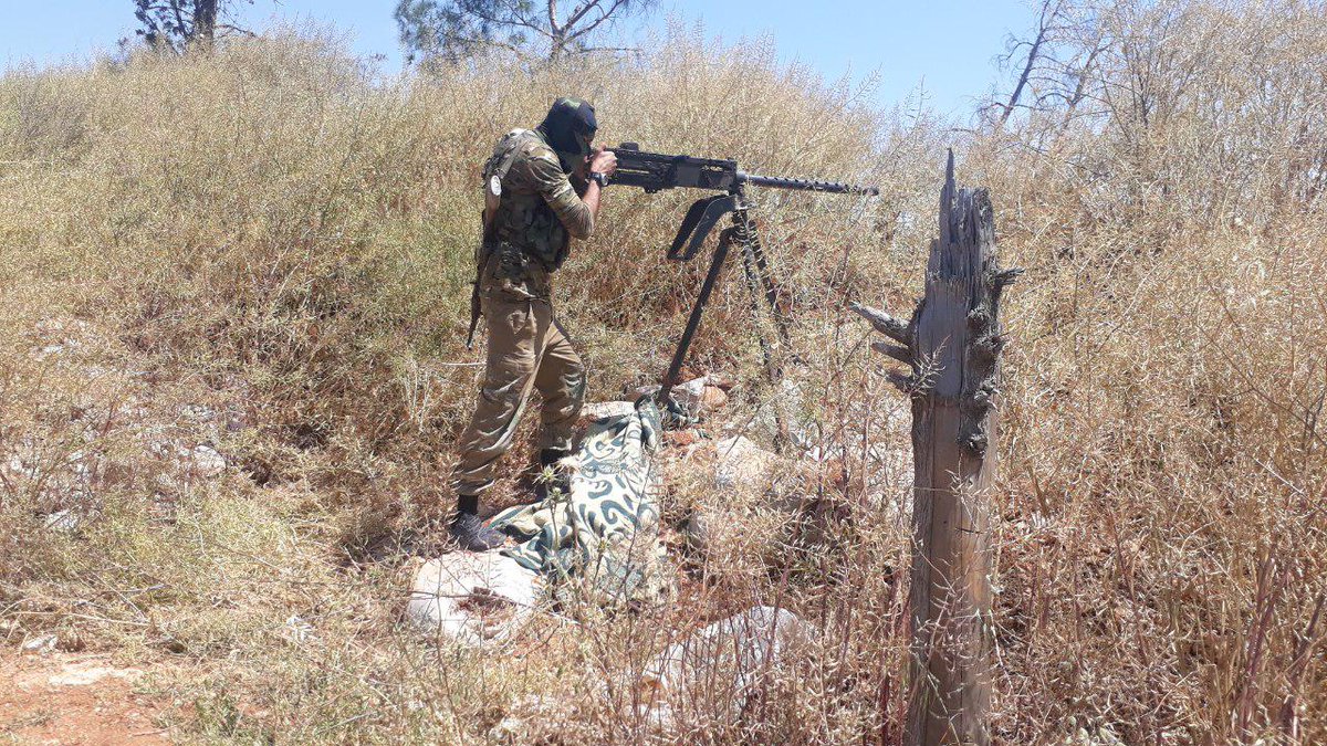 borrowed an M16A4 with a low-power scope for a video from a friendly fighter. The group also has a suppressed craftmade copy of the Iranian AM-50 with a Chinese W85 HMG barrel. Here he can be seen with a Browning AN/M2.50 cal aircraft HMG. Conclusion: Junud al-Sham or 10/