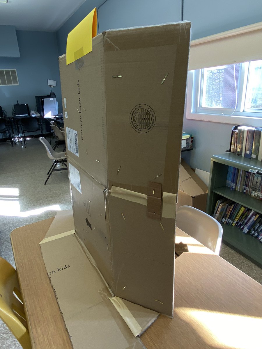 MrReuland's tweet image. Cardboard mechanism example board. Hinged and foldable, so portable and storable, but also self supporting.  Still debating labeling the mechanisms. #cardboardengineering #mustanglibrarians