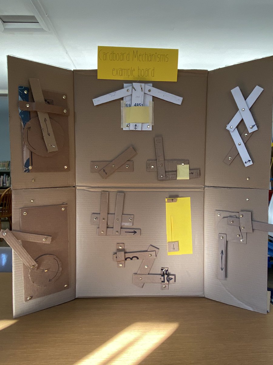 MrReuland's tweet image. Cardboard mechanism example board. Hinged and foldable, so portable and storable, but also self supporting.  Still debating labeling the mechanisms. #cardboardengineering #mustanglibrarians