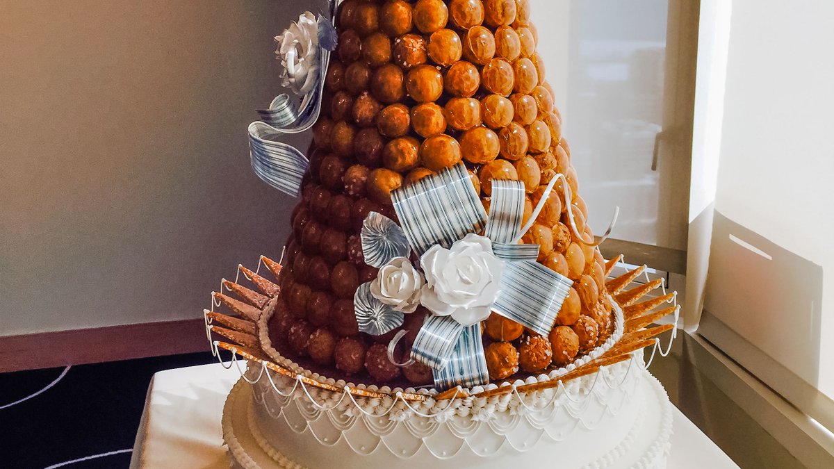 ChefJJoho's tweet image. The French Croquembouche is a celebration dessert made with choux pastry and ribbons of caramel. The perfect show stopper for any wedding, especially at @Everest_Chicago.