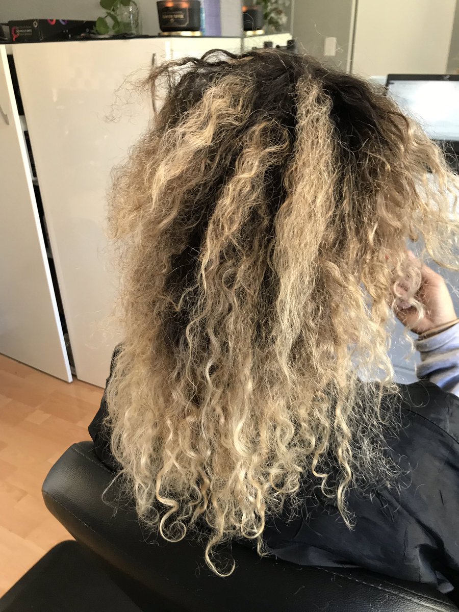 Saving curls, one day at a time... we tried to keep as much length as possible while connecting the short top layers... along with lots of treatments and a cut
