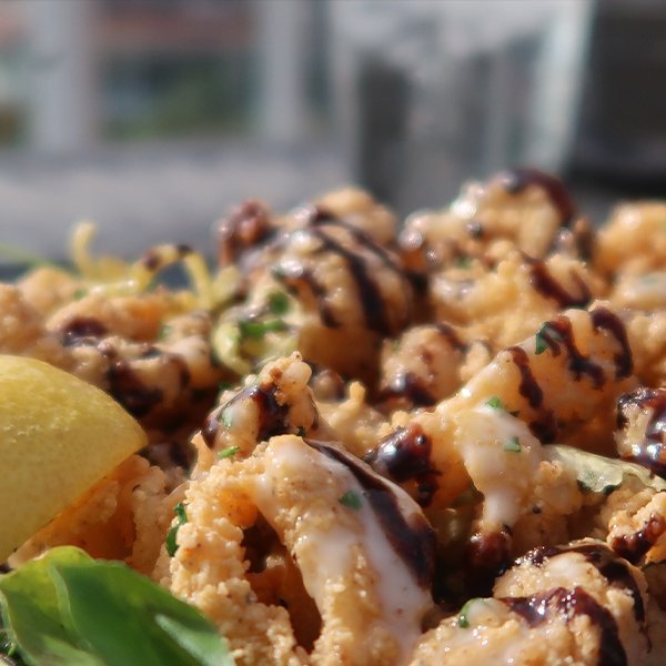 UptownNetwork's tweet photo. Today's featured food is OverVue's Garbanzo Crusted Calamari. Tender squid, rock shrimp, pepperonici, watercress, radicchio, served with whole leaf hops aioli, and black garlic vinaigrette. OverVue is located in The @LagunaCliffs Marriot.
#lagunacliffs #tabletmenu #restauranttech https://t.co/52wteOoYCm