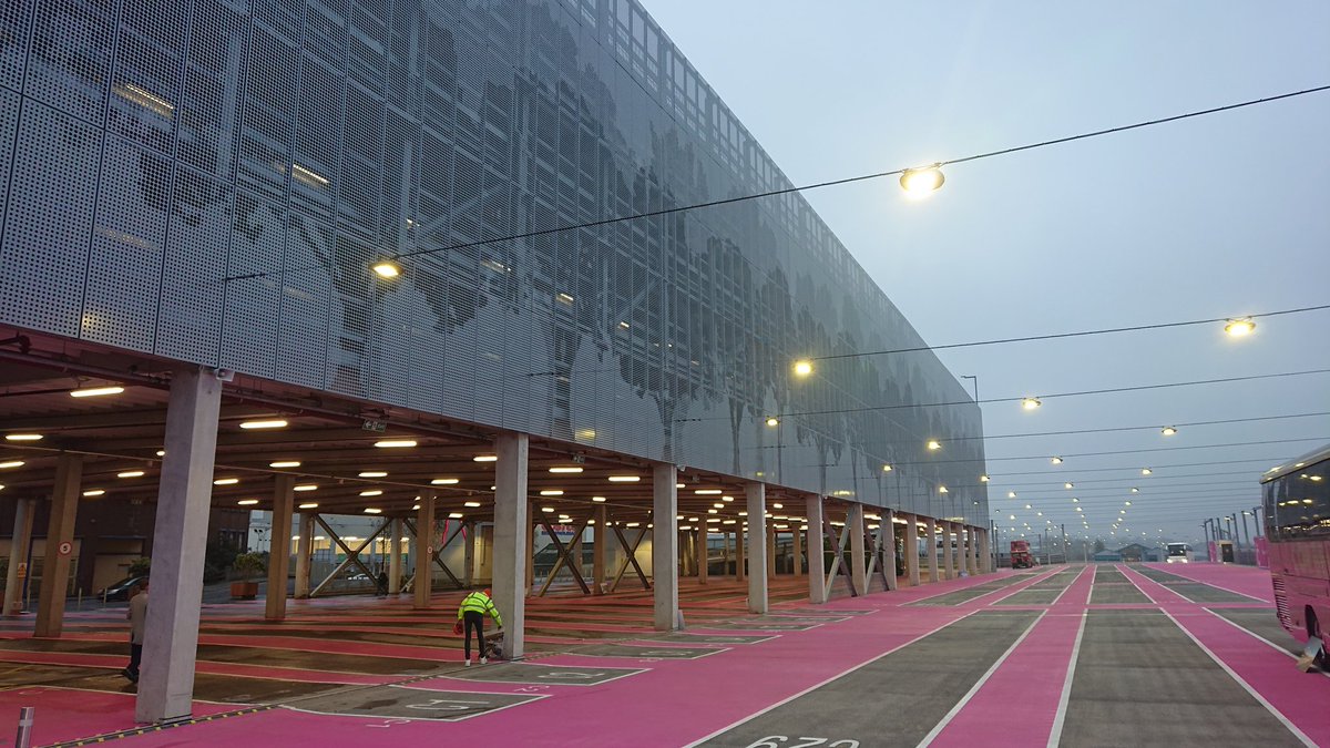 CodeckLtd's tweet image. The pink multi storey bus/car park in Wembley is now complete, the first of its kind in Europe, it sure stands out.  @CodeckLtd working with Huber car park systems, installing over 30,000m of steel decking to this amazing looking project.