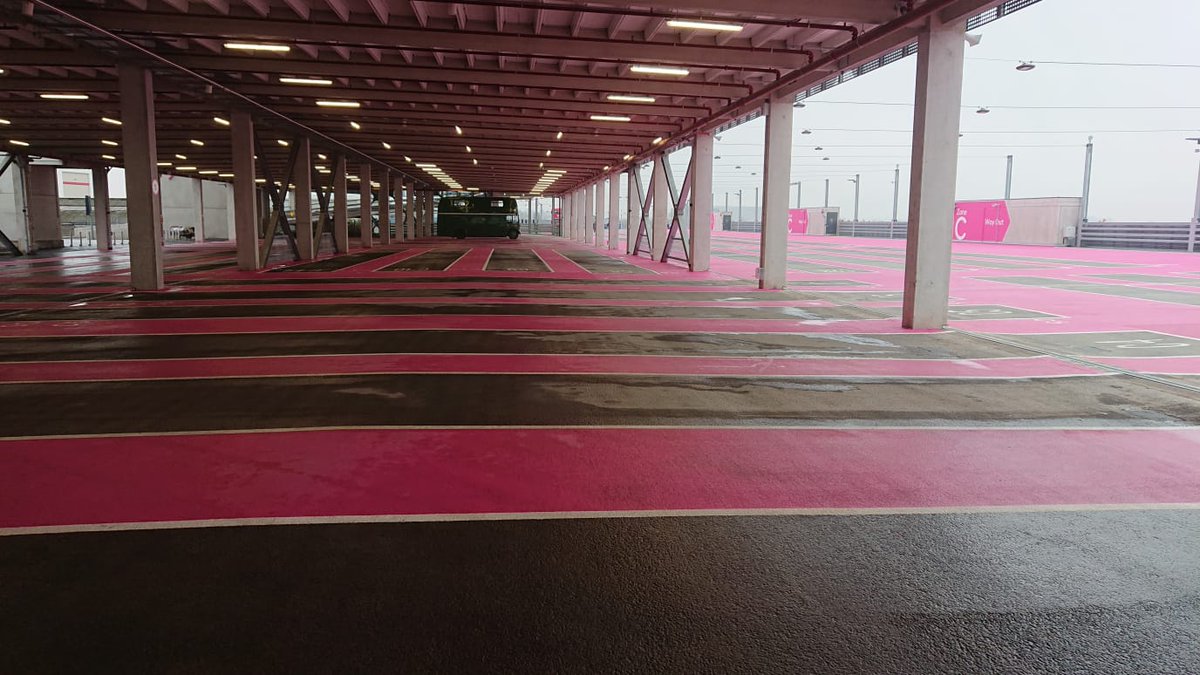 CodeckLtd's tweet image. The pink multi storey bus/car park in Wembley is now complete, the first of its kind in Europe, it sure stands out.  @CodeckLtd working with Huber car park systems, installing over 30,000m of steel decking to this amazing looking project.