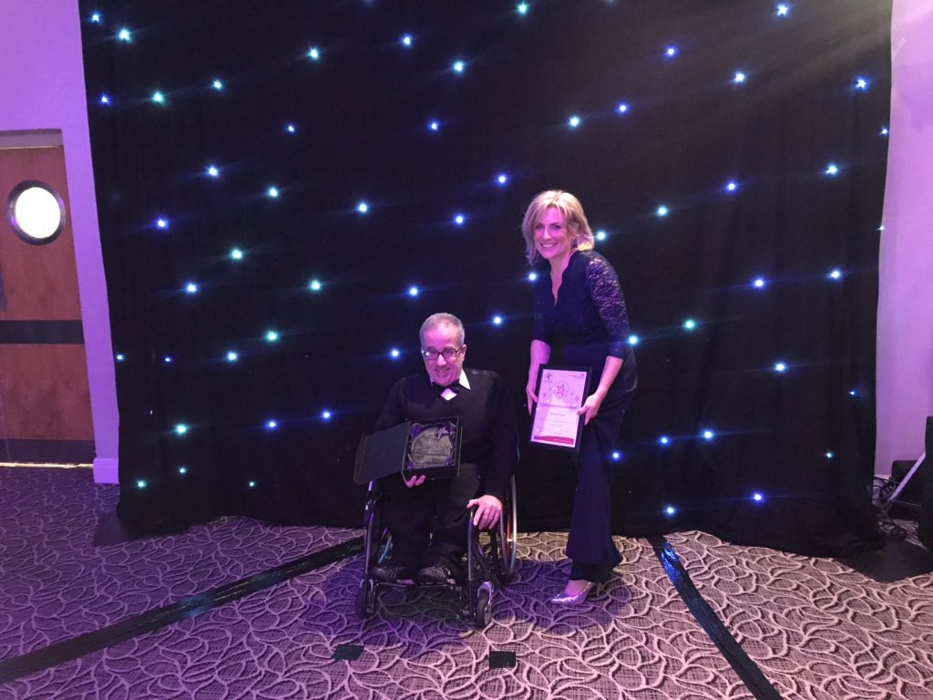 RJAH_NHS's tweet photo. It’s now time for our next award, the League of Friends Volunteer of the Year Award 👏🏼

We welcome Victoria Sugden, Charity Director for the LoF, to present this award, with the winner being announced as Gwyndaf Lloyd! 

Well done Gwyndaf! #RJAHawards https://t.co/zgkDPcH1X4