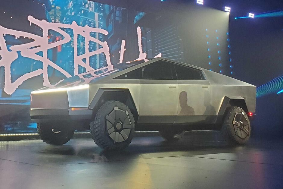 theonemic's tweet photo. It’s like the DeLorean and Marty’struck got together and had an offspring #Cybertruck https://t.co/ERqBB8C72g