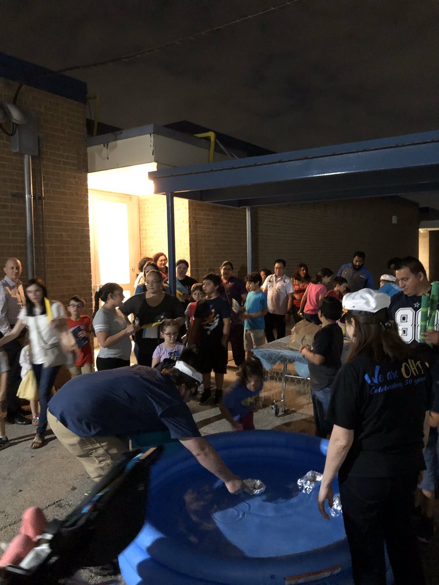 MsBullinger's tweet photo. We’re “sailing through 2nd grade” at OHT’s Academic Night!! Creating “sea worthy” boats out of foil and testing them with pennies was a huge hit! #OHTHoot4TheMoon #NISDOHT https://t.co/mPwZ6OqCIm