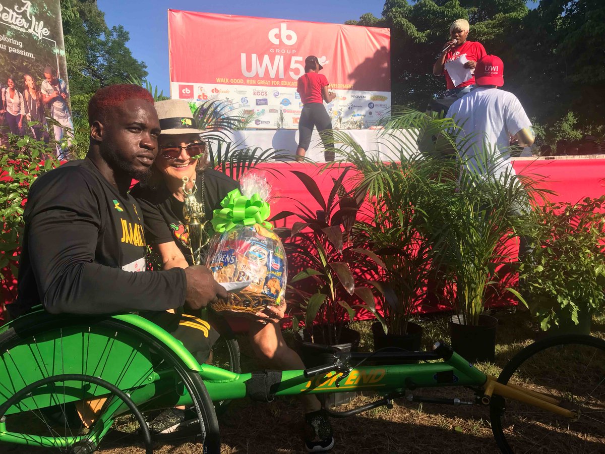 NCBFoundation's tweet photo. N.C.B. Foundation Chairman, Thalia Lyn presenting the Paralympic winners of the wheel race at the UWI 5K Run.
#UWI5K #NCBFoundation #GiveBack #Education #Scholarships #TunForScholarships https://t.co/diMiCNpDJH