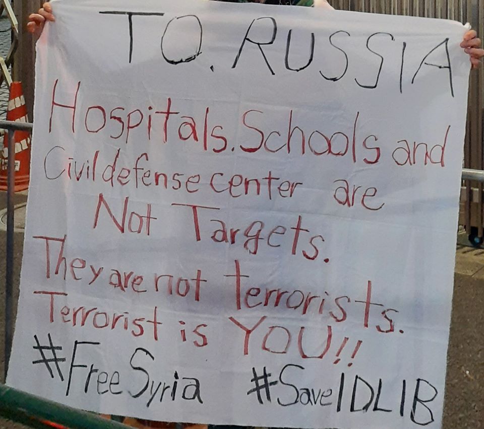 EyesOnIdlib's tweet photo. From Japam our Friend Takako demonstrating in front of the Embassy of the Russian Federation
"to Russia:
Hospitals, schools, and civil defense center are not targets
Don't kill innocent civilians
They are not terrorists
You're a terrorist!!"
#SaveIdlib #WithIdlib #FreeSyria https://t.co/3ZIopfQ2qa