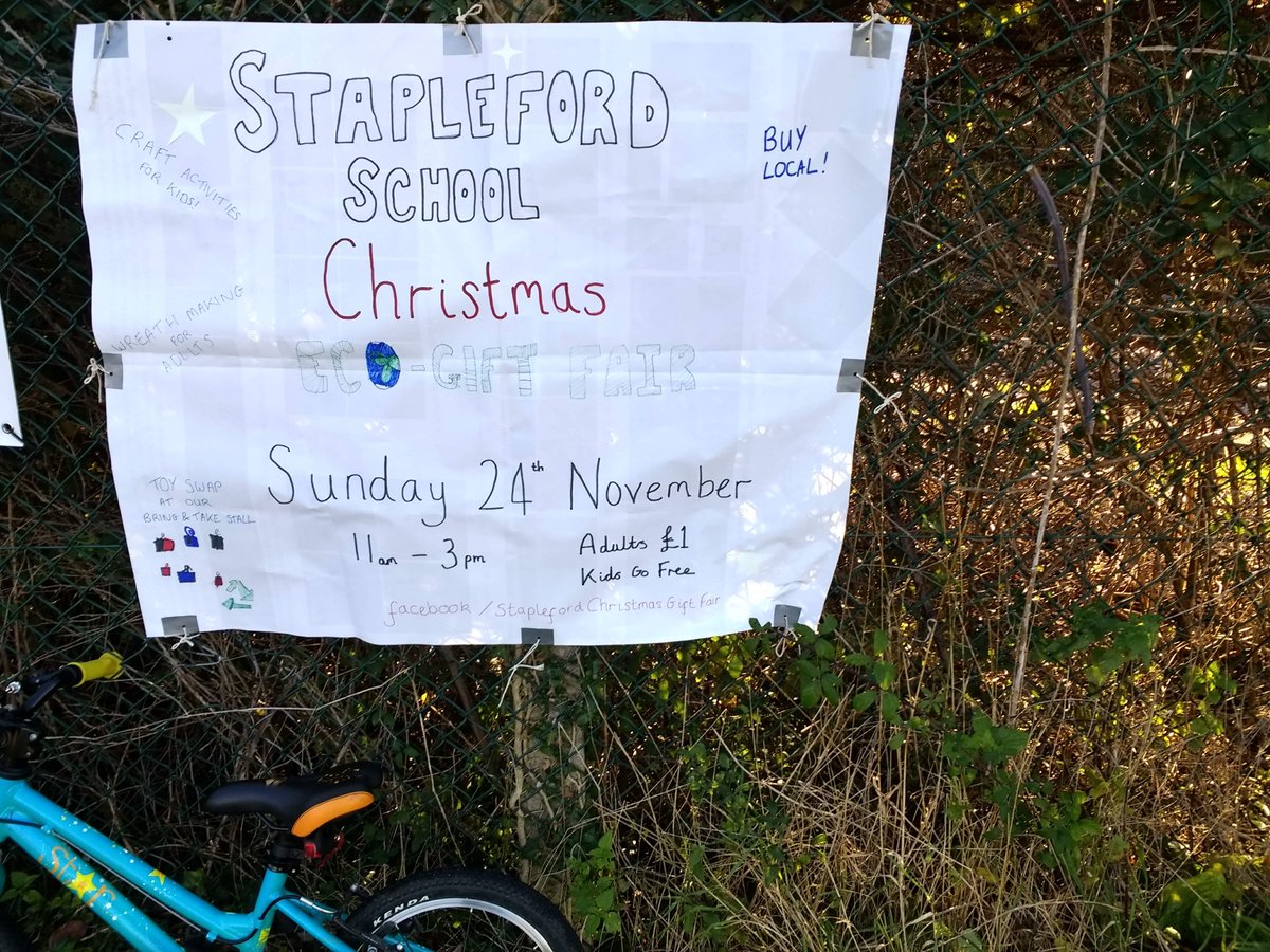 Advertising our fair to cyclists on the DNA path. What a lovely day for a ride #HopethePensAreReallyPermanent #OntheBackofScience