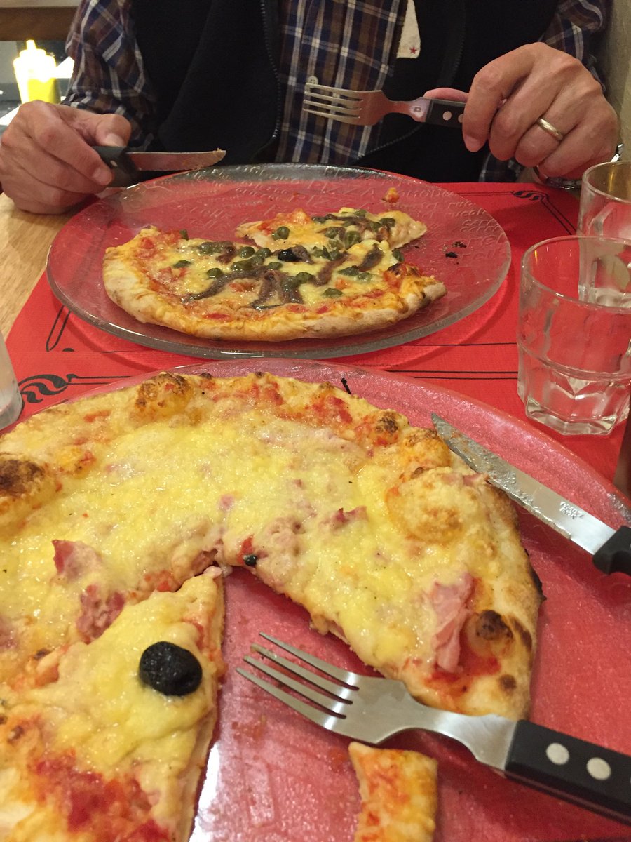 EdithKeene's tweet photo. It took a long time to get from Perpignan to Toulouse because our train was delayed and then cancelled.  Took a later one that wasn’t direct and got to our apartment 4 hours late and too tired for anything but pizza at the place down the street.  Which was actually delicious! https://t.co/BeJKUV1dcx