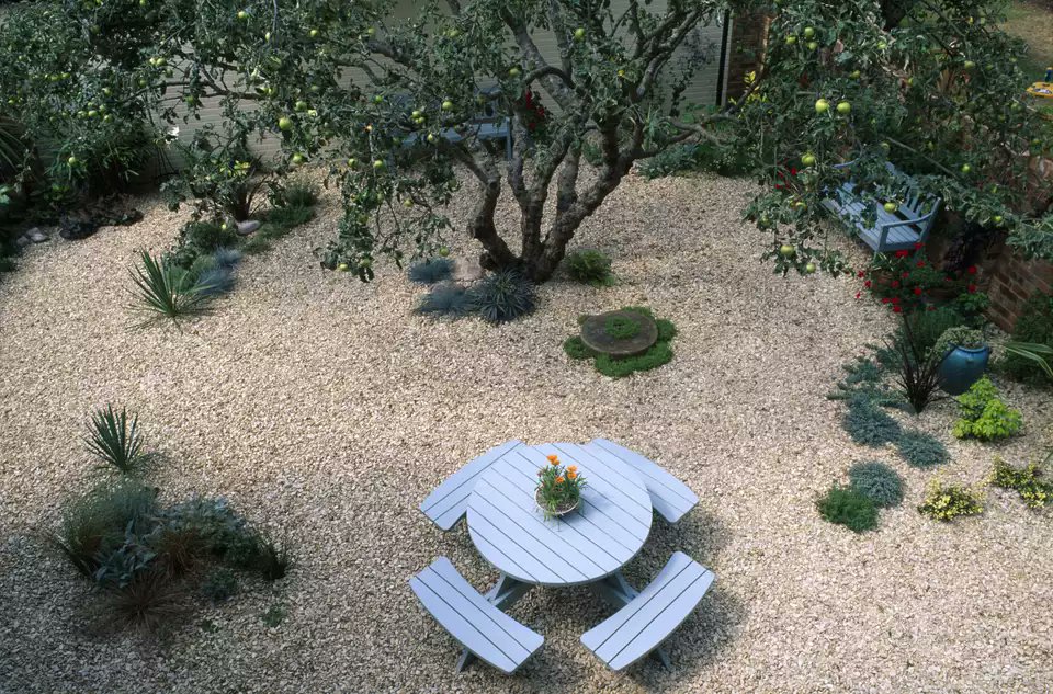 Gravel is a simple and inexpensive option for any #garden. #patio http://cp...