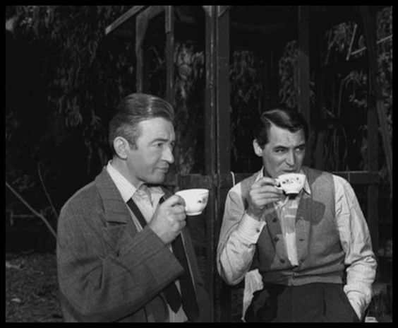 ClassicMovieHub's tweet image. Claude Rains and Cary Grant having tea on the set of Notorious, un-poisoned of course :)