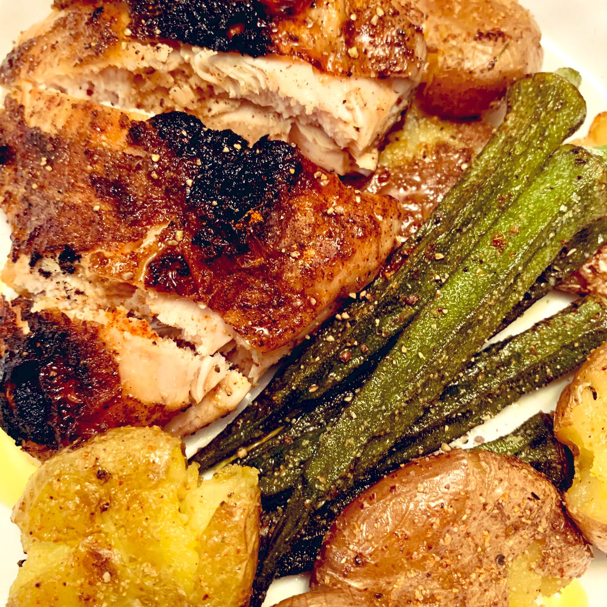 Jerk turkey breast, roasted smashed petite potatoes and okra with a drizzle of lime infused olive oil 💛