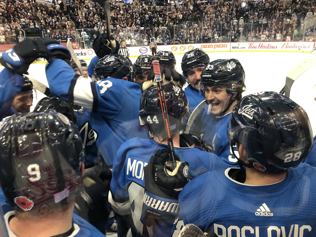 Chrissy_8rown's tweet photo. First row seats, and the Jets celebrating their victory directly in front of me 😍 It was a good day! https://t.co/Y9uOvYdAYF