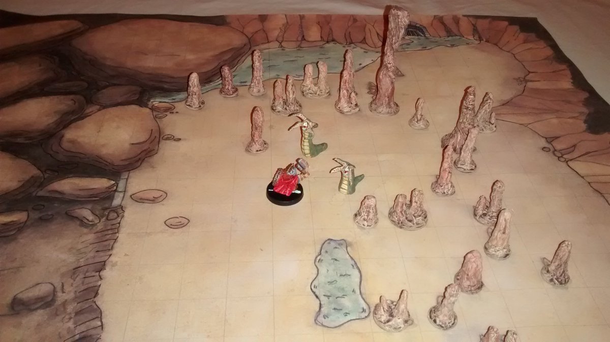 Saferfantasycr1's tweet photo. Here's what 'potato rock cave' looks like on the table top with some of my patent #DAS/ #papermache stalagmites and grick monsters for a 2.5D ambush. #dnd #mapvember #dmscotty https://t.co/G7HcNOhhbJ