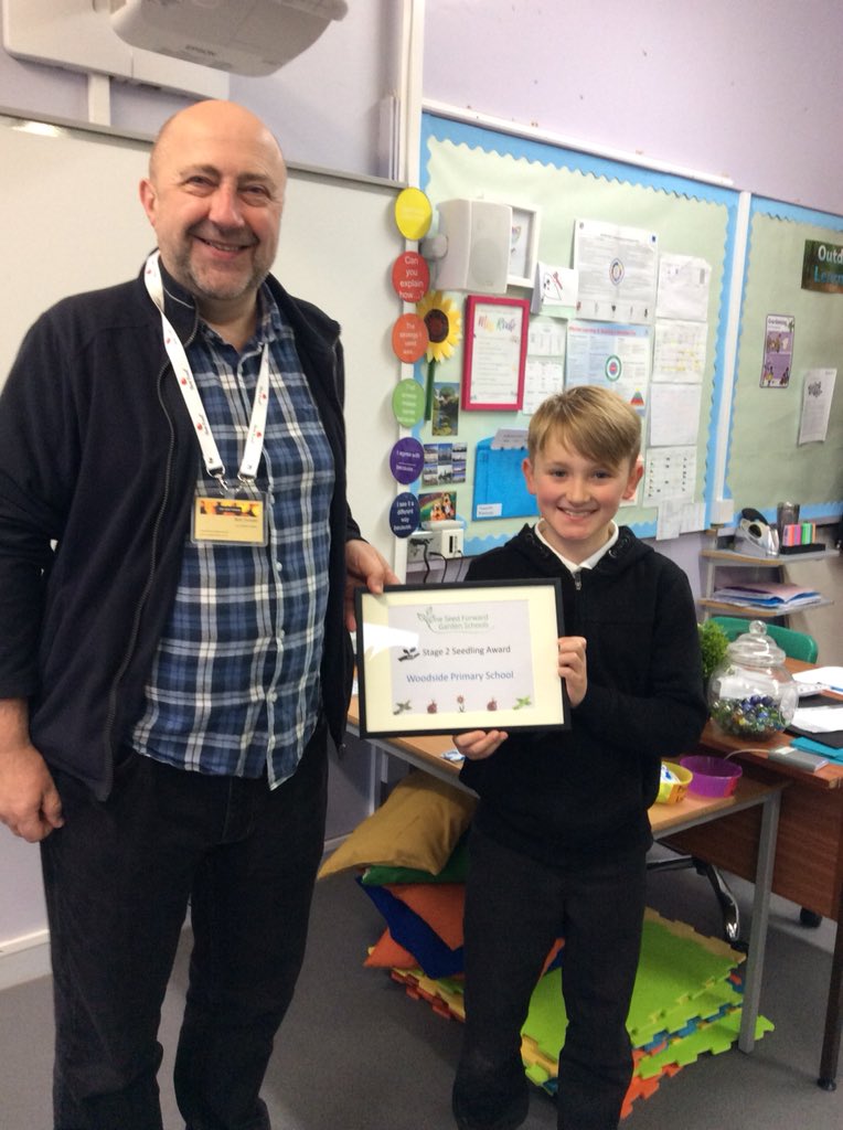 Room3woodside's tweet photo. Bob our Gardener helper came to present our certificate for one seed forward! We were very proud to accept it. @woodside_school Green Grassy Growers Pupil voice gardening group. Creative, resilient and determined learners who work hard in all weathers!  @WoodsideRRS  @VLWoodside https://t.co/U25ZyjPW8K