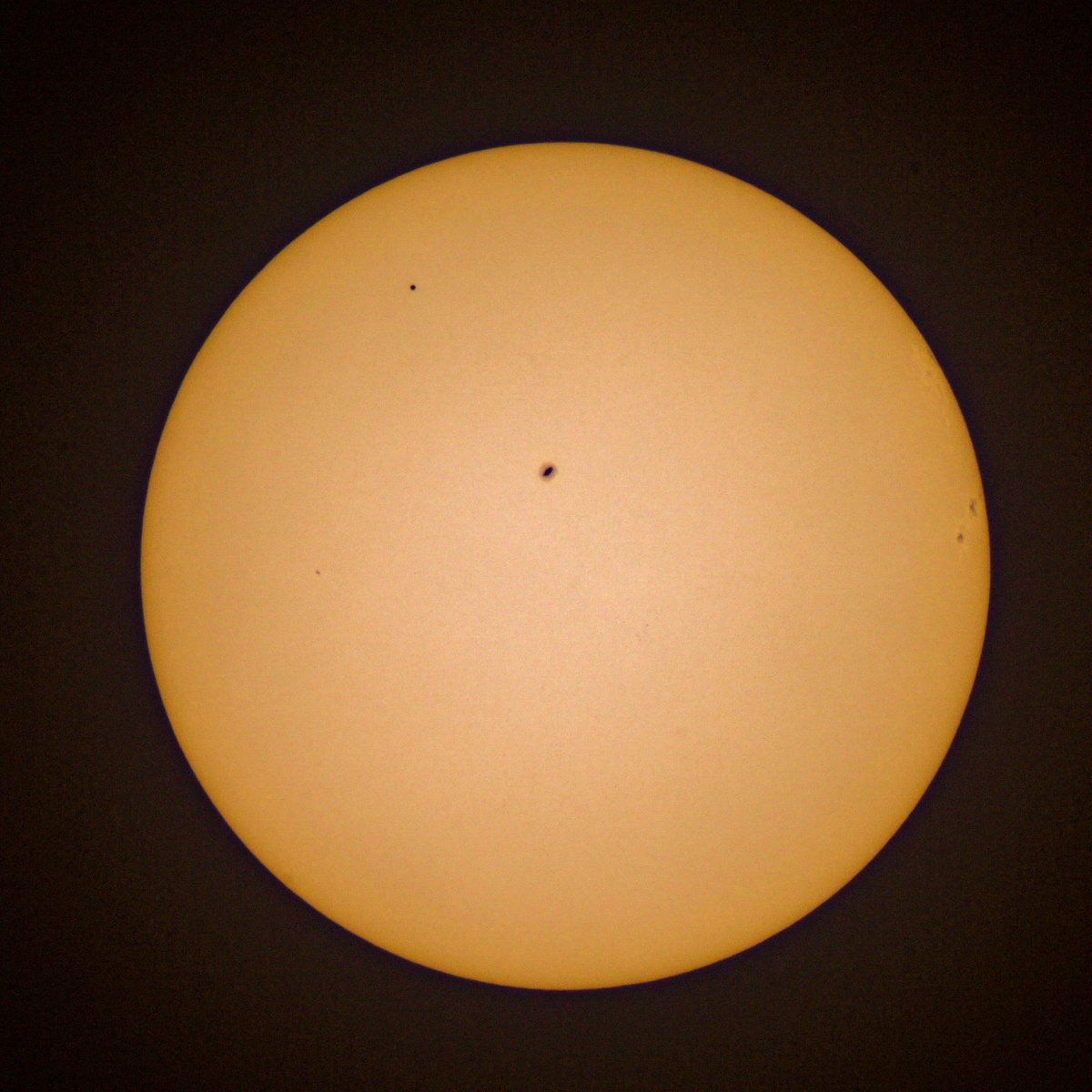 Well..... this it what is should look like today. The little dot in the left top corner is Mercury. Took this photo in 2003.
Unfortunately the eclips we're gonna see is caused by clouds. 
It's tiny anyway.....